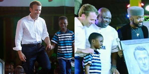 French President Emmanuel Macron, left, walk on the stage with 11 years -old, Kareem Waris Olamilekan, right, a young Nigerian artist who drew President Macron, Portarit, left, during an event to celebrate African Culture at the New Afrika shrine in Lagos, Nigeria, Tuesday, July 3, 2018. Macron arrived Abuja earlier for a meeting with his Nigerian counterpart Muhammadu Buhari, in his latest attempt to forge closer ties with English-speaking Africa. (AP Photo/Sunday Alamba)