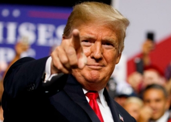 President Donald Trump arrives for a campaign rally at Florida State Fairgrounds Expo Hall, Tuesday, July 31, 2018, in Tampa, Fla. (AP Photo/Evan Vucci)