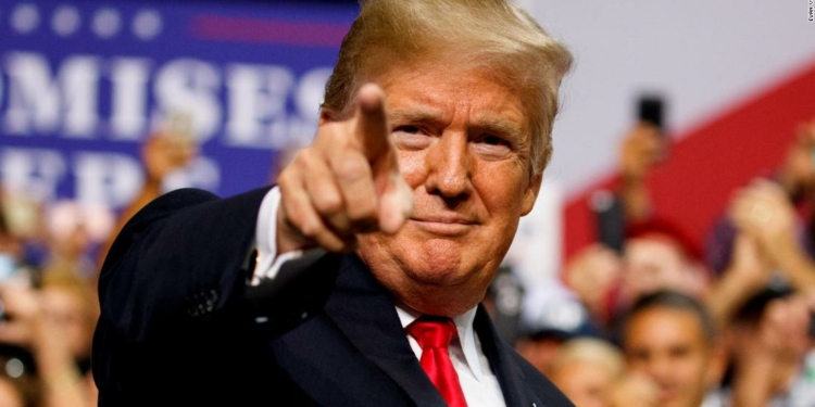 President Donald Trump arrives for a campaign rally at Florida State Fairgrounds Expo Hall, Tuesday, July 31, 2018, in Tampa, Fla. (AP Photo/Evan Vucci)