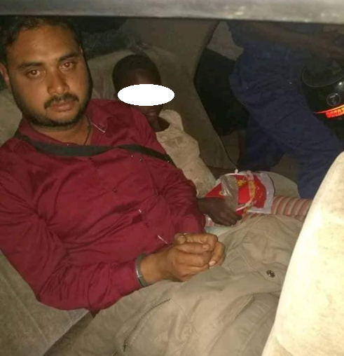 Indian man caught having sex with underage homeless African girl (photo)
