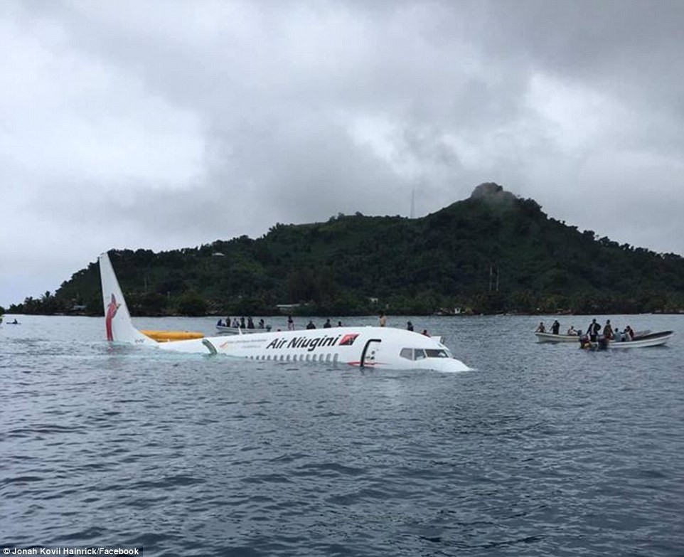  Plane overshoots a runway in Micronesia and crash lands in the ocean..but all 47 passengers and crew miraculously survive (Photos/Video)