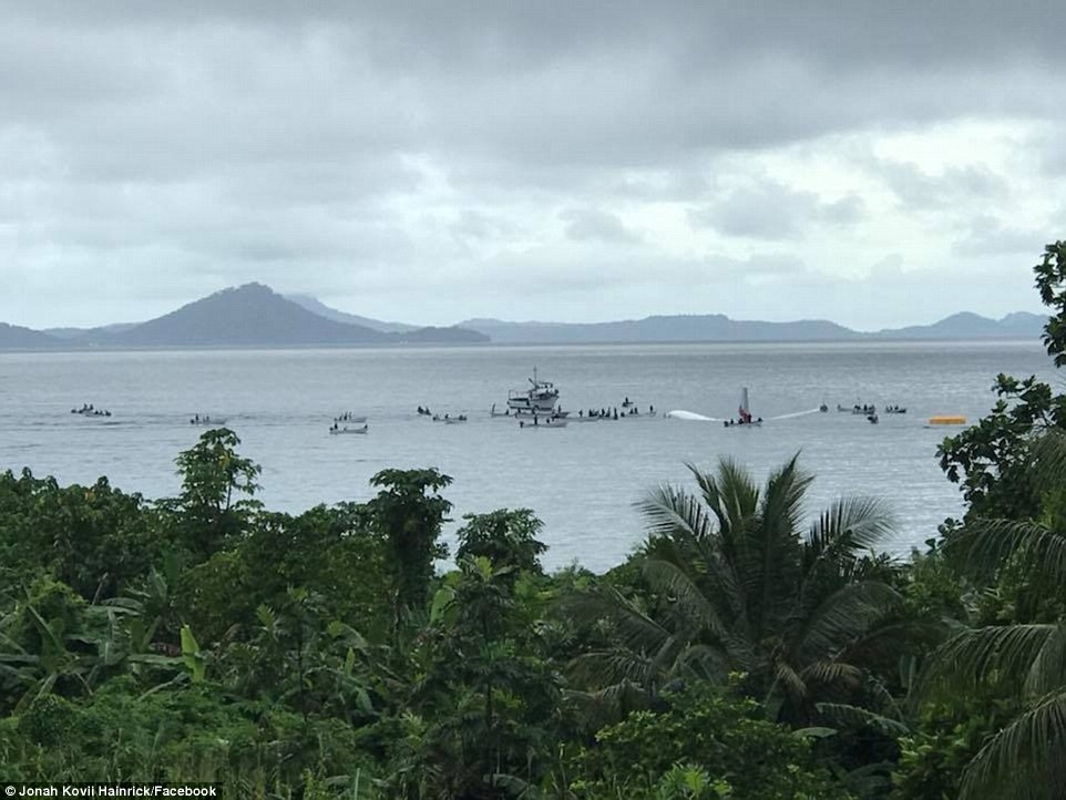  Plane overshoots a runway in Micronesia and crash lands in the ocean..but all 47 passengers and crew miraculously survive (Photos/Video)