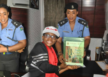 Photos of Ozzybee  recieving honours from Nigeria Police Force