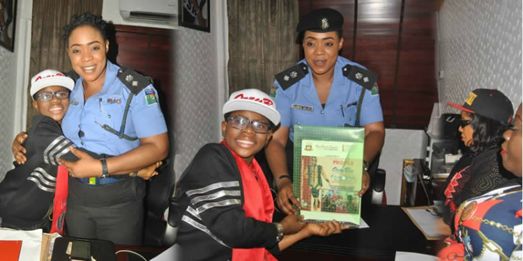 Photos of Ozzybee  recieving honours from Nigeria Police Force