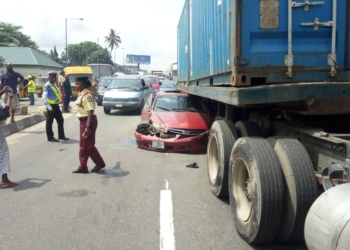 Car runs under trailer at Ojuelegba in Lagos