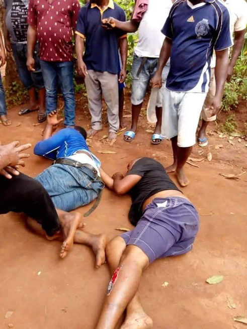 Men stripped naked and beaten after allegedly being caught stealing from a shrine (photos)