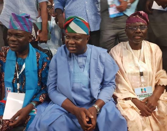 Photos: Governor Ambode and Babjide Sanwo-Olu all smiles as they meet at the APC convention in Abuja