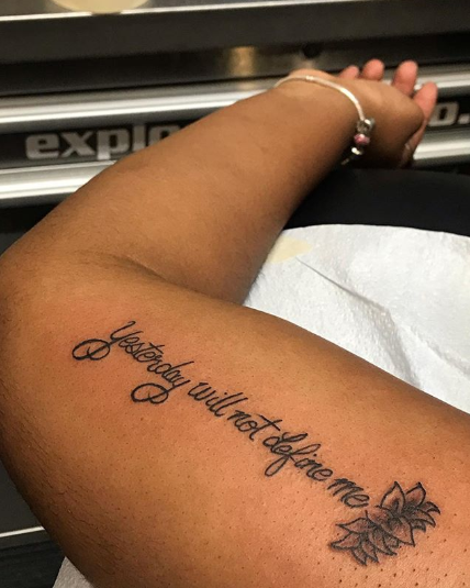 Moet Abebe gets an 11th tattoo with the words "yesterday will not define me" and shares the story behind it