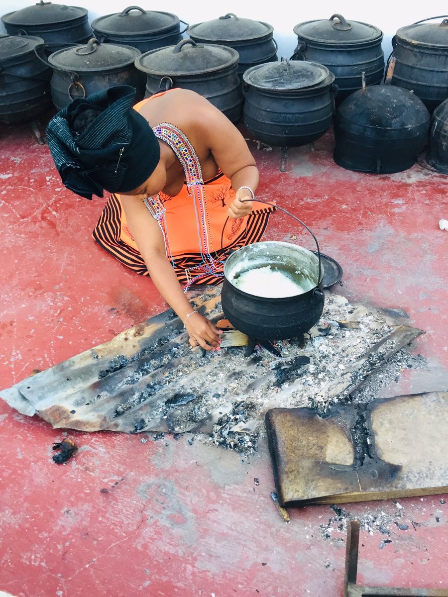 South African radio host Buhle Geleba poses topless to embrace her culture... 18+