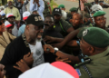 Dino Melaye Confronting Police during PDP protest in POLICE HQ, Abuja