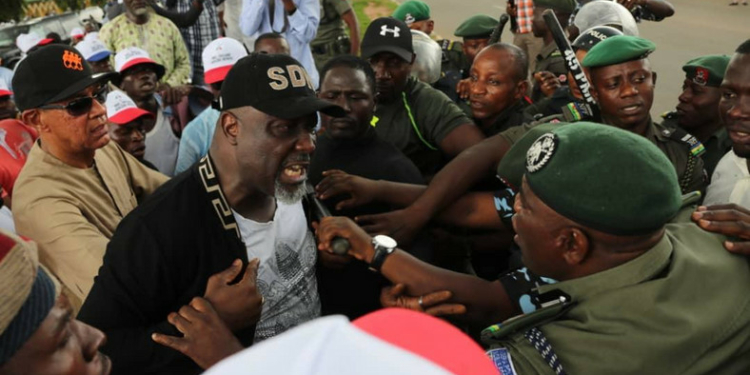 Dino Melaye Confronting Police during PDP protest in POLICE HQ, Abuja