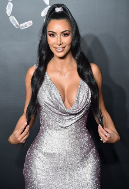 Kim Kardashian and Kanye West steal the show at star-studded Versace show