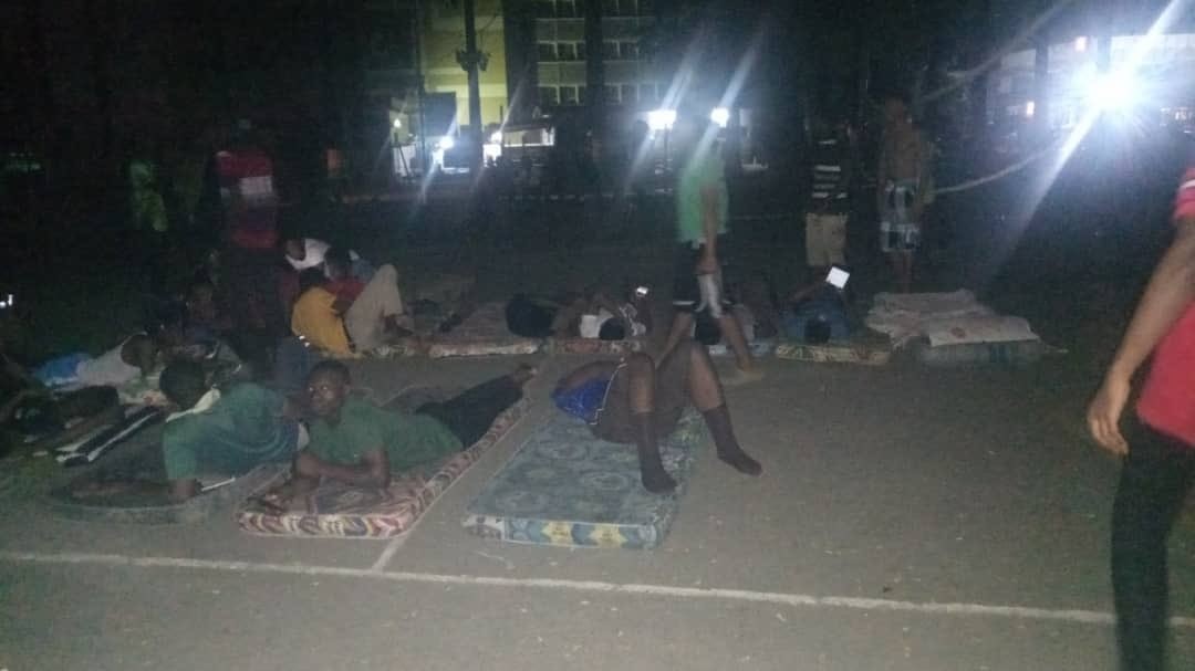 Photos: University of Lagos medical students sleep on the road due to power outage in their hostels