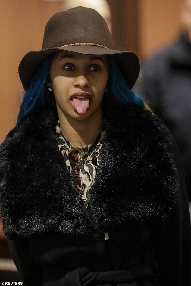 Newly single Cardi B ?sticks out her tongue as she finally appears in court over a fight?at a strip club (Photos)