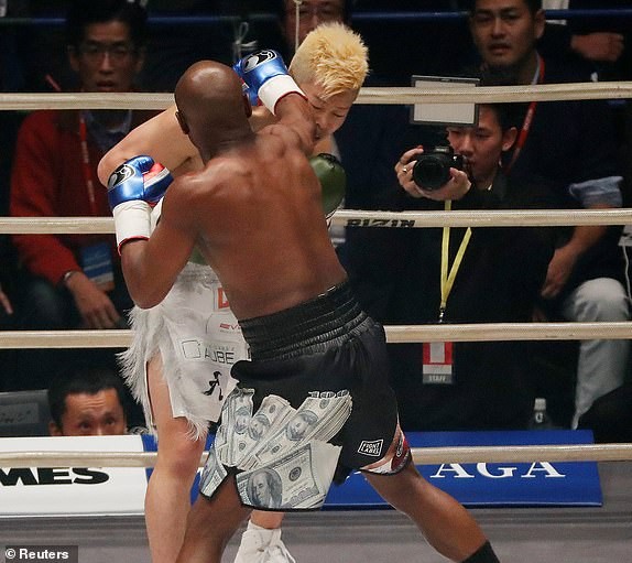 Floyd Mayweather makes $9M in just two minutes after beating 20-year-old kickboxer Tenshin Nasukawa in exhibition bout (Photos)