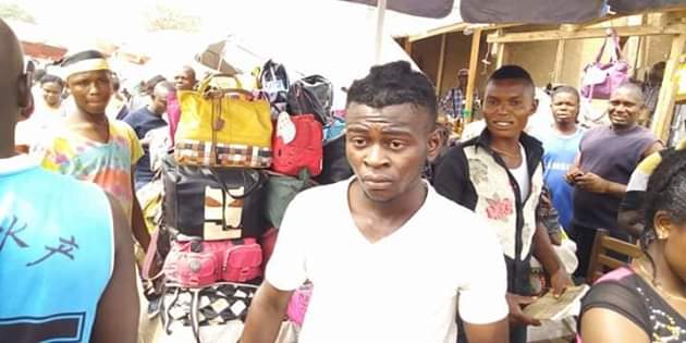 Photos: Outrage as youths storm market in Gboko, Benue and forcefully shaved young men with