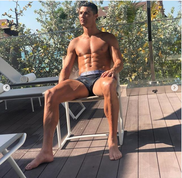 Cristiano Ronaldo flaunts his hot physique as he strips down to his briefs (Photos)