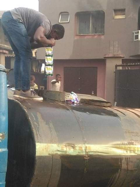 Photos: Residents in Nnewi resort to manual method; detergent and water to put out fire after Fire Service failed to respond