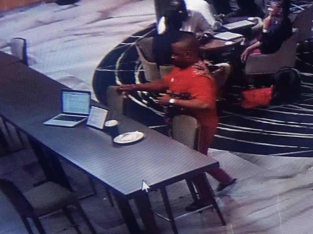 Photos/Video: Suspected thief caught on camera stealing the Macbook of a guest at Radisson Blu Hotel