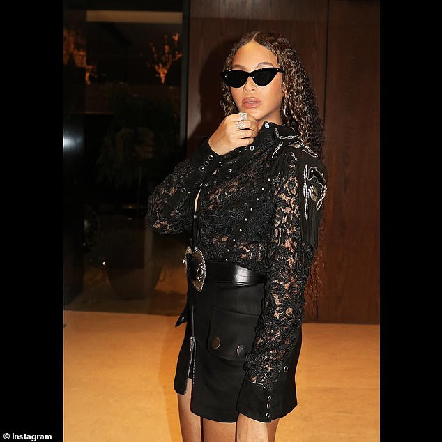 Beyonce flaunts her backside in stylish black lace top and skimpy mini skirt (Photos)