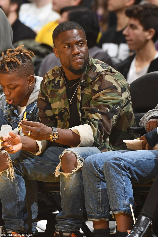 Kevin Hart enjoys quality time with his family as they sit courtside at star-studded Lakers game (Photos)