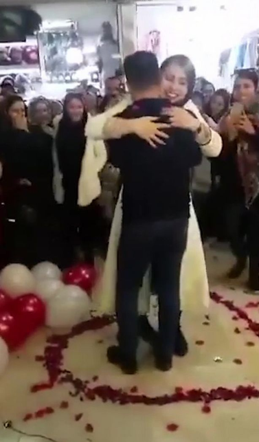 Couple arrested in Iran over romantic shopping mall proposal because it "offended Islam" (video)