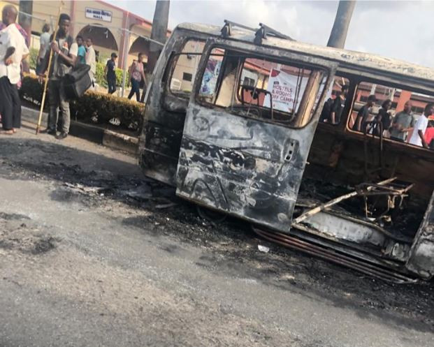 Photos/Video: Commercial bus goes up in flames inside Unilag
