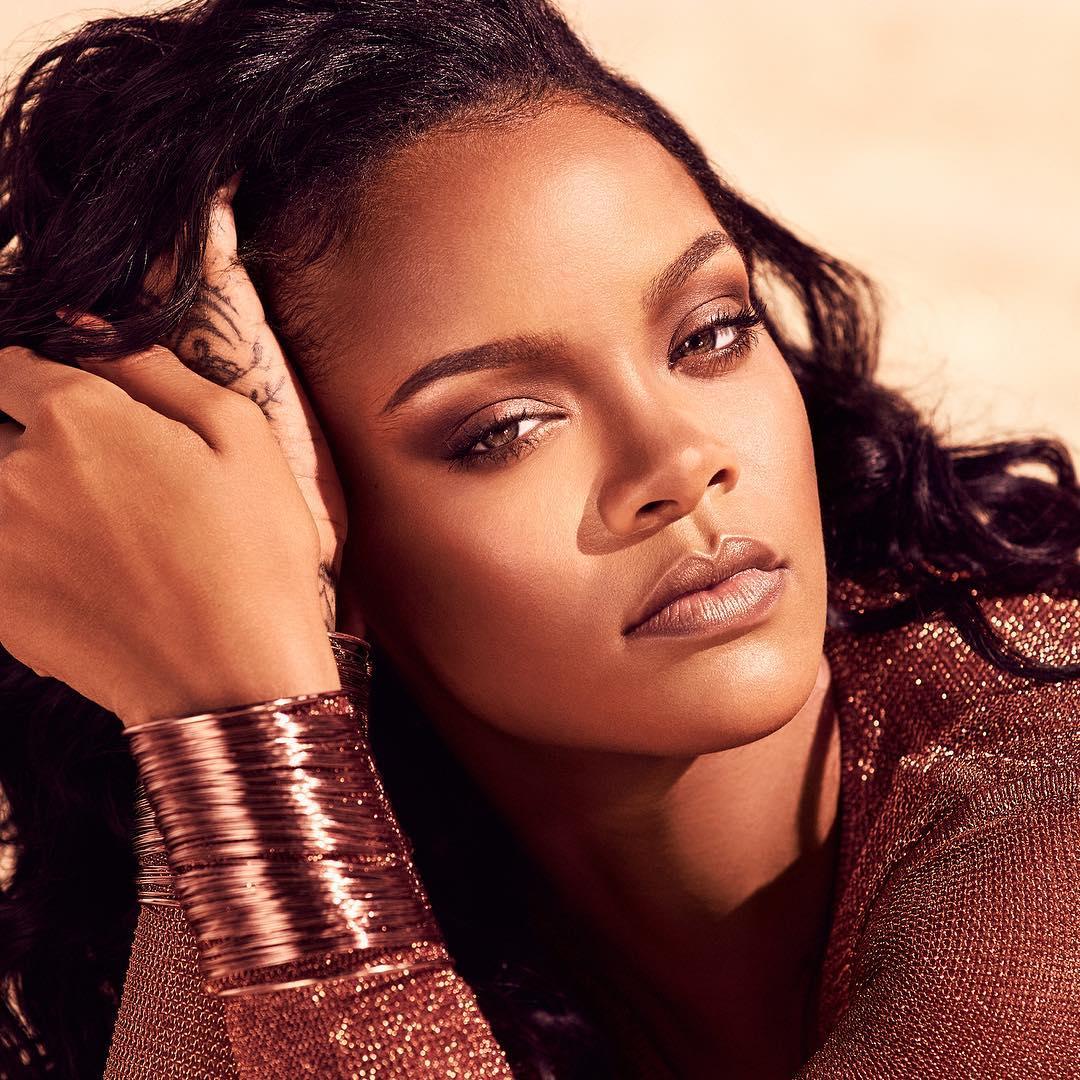 Rihanna strikes suggestive pose in a low-cut leotard (Photos)1080 x 1080
