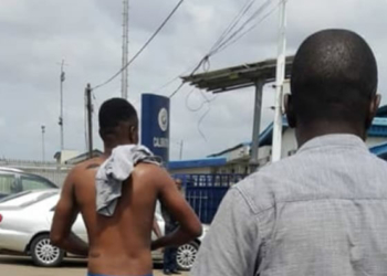 Uber Driver strips in Lagos Airport