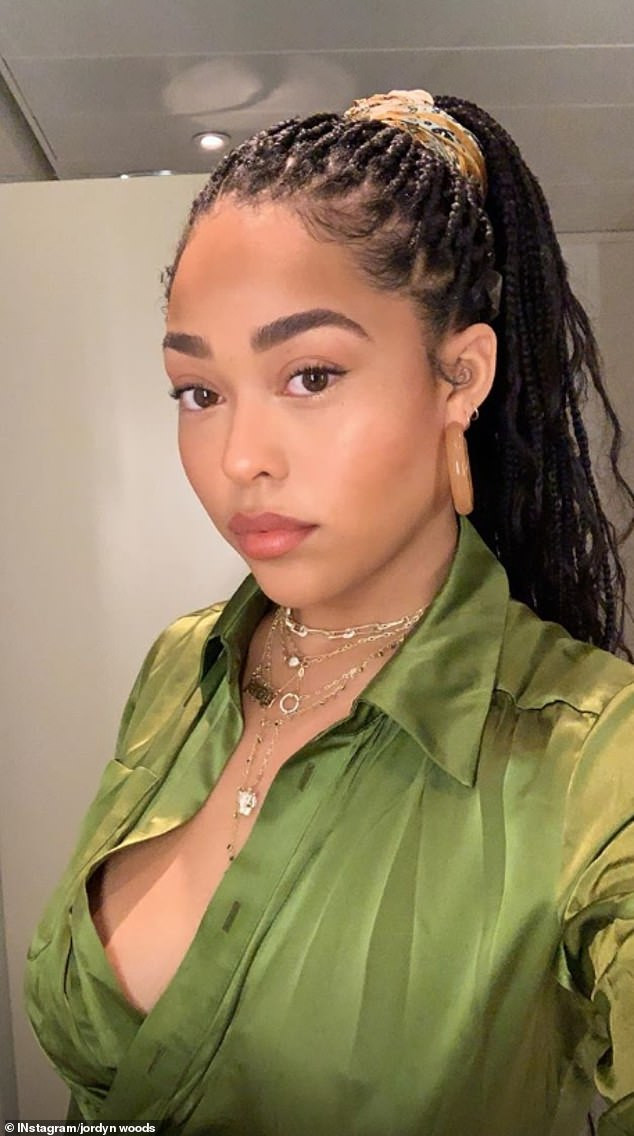Jordyn Woods goes braless in plunging khaki dress as she steps out in Lagos (Photos)