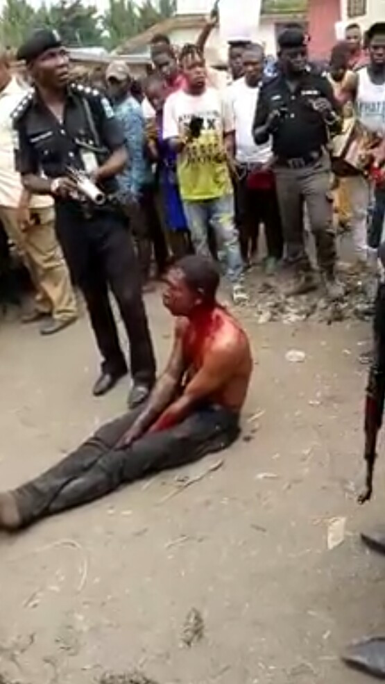  Photos/Videos: Notorious car thief nabbed and brutally beaten by irate mob in Abuja