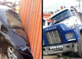 40 feet container crushes two vehicles loading passengers