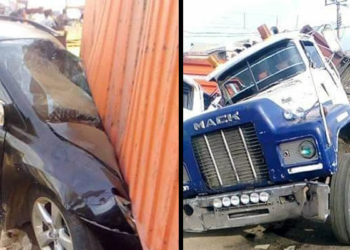 40 feet container crushes two vehicles loading passengers