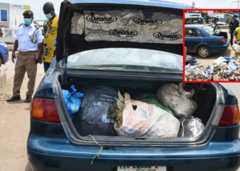 dumping refuse on the median in Ejigbo LCDA.