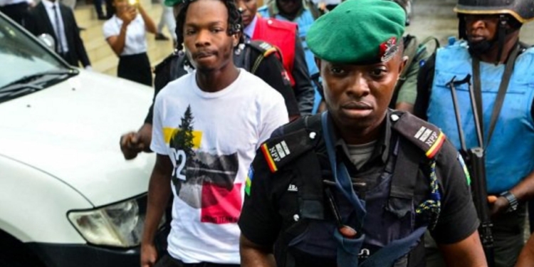 Naira Marley heavily guarded by Police