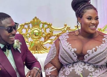 A groom and his BBW bride on their wedding day