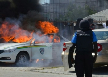 Nigeria police vehicle on fire