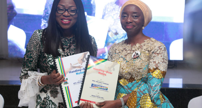 Wife of the Governor of Lagos State and chairman, Committee of Wives of Lagos State Officials (COWLSO), Mrs Bolanle Ambode (L) and wife of the Governor-elect, Dr. (Mrs.) Ibijoke Sanwo-Olu (R), displaying the handing-over documents after signing, during the handing-over ceremony wife of the in-coming governor, at the Lagos House, Alausa, Ikeja, over the weekend.
