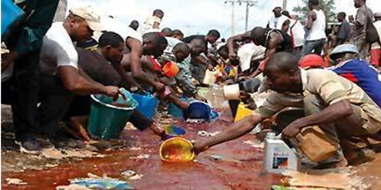 Residents scooping PMS in Lagos