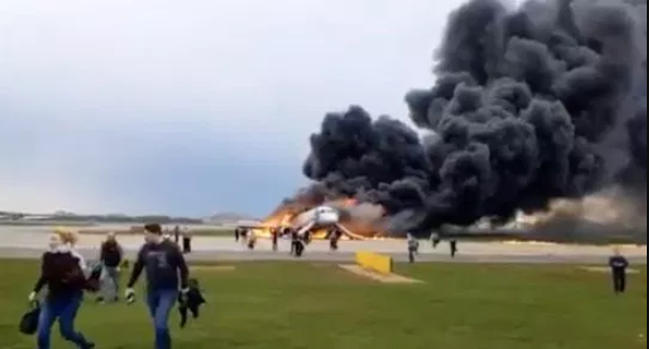 At least one dead as plane erupts into flames during an emergency landing in Moscow