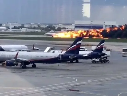 At least one dead as plane erupts into flames during an emergency landing in Moscow