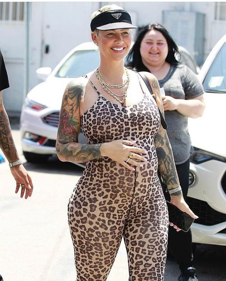 Pregnant Amber Rose shares loved up photos of her and her man Alexander 