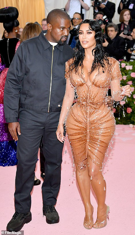 Kim Kardashian puts her curves on display as she arrives the Met Gala in figure-hugging Maison Mugler gown