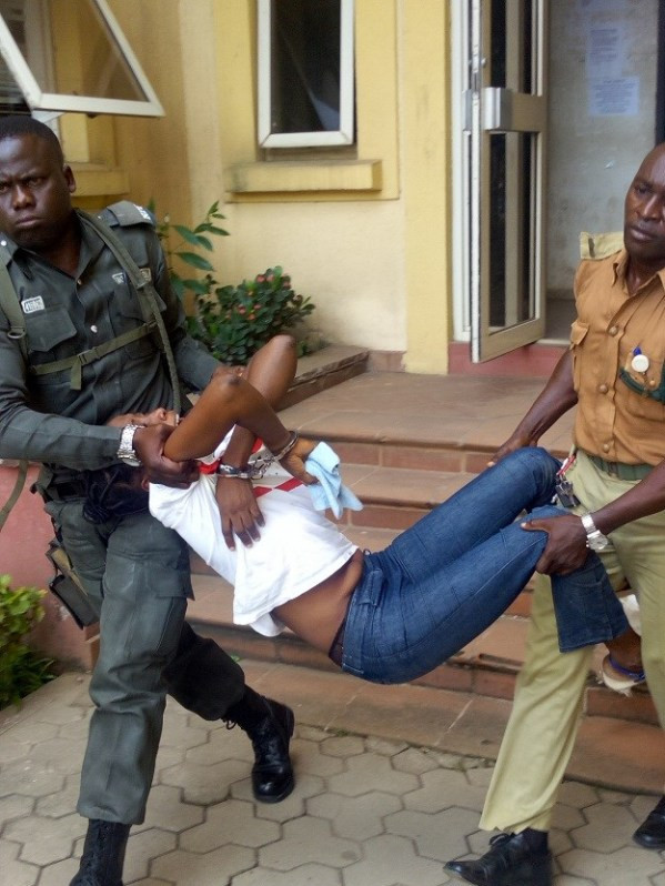 Photo: Woman collapses and carried out of court after being sentenced to death for killing her neighbour during fight in Ajegunle, Lagos