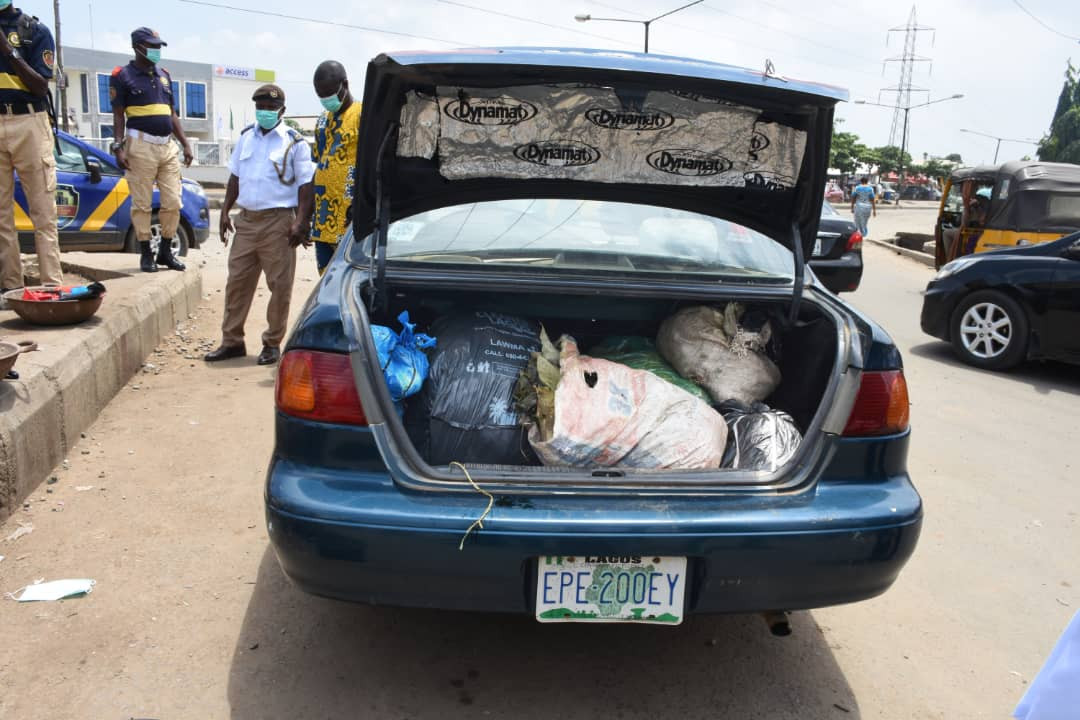 Photos: See what police did to a man caught dumping refuse on the streets of Lagos