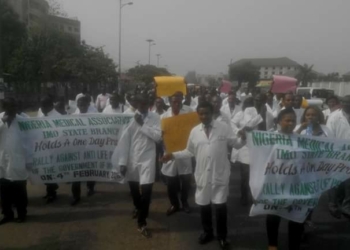Doctor protesting unpaid allowances