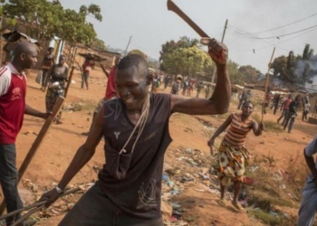 Youths in a community protest after an attack by suspected fulani herdsmen
