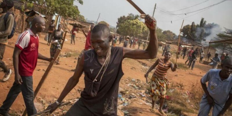 Youths in a community protest after an attack by suspected fulani herdsmen