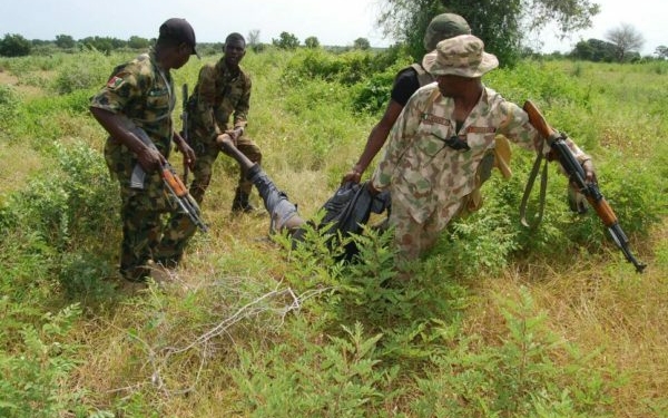 A Boko Haram terrorist retrieved from the bush by Nigerian troops.