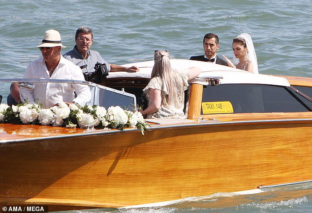  Arsenal football star, Henrikh Mkhitaryan and his bride?board water taxi to their wedding reception in Venice (Photos)